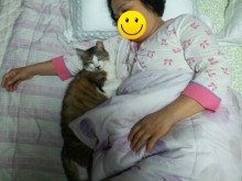 sleeping with grandmother. happy time with family. 